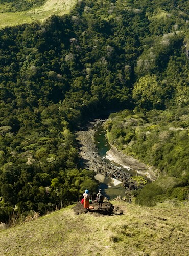 Two people looking down into the Sigatoka river valley from high up